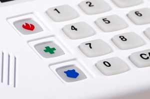 Home security alarm keypad with emergency buttons